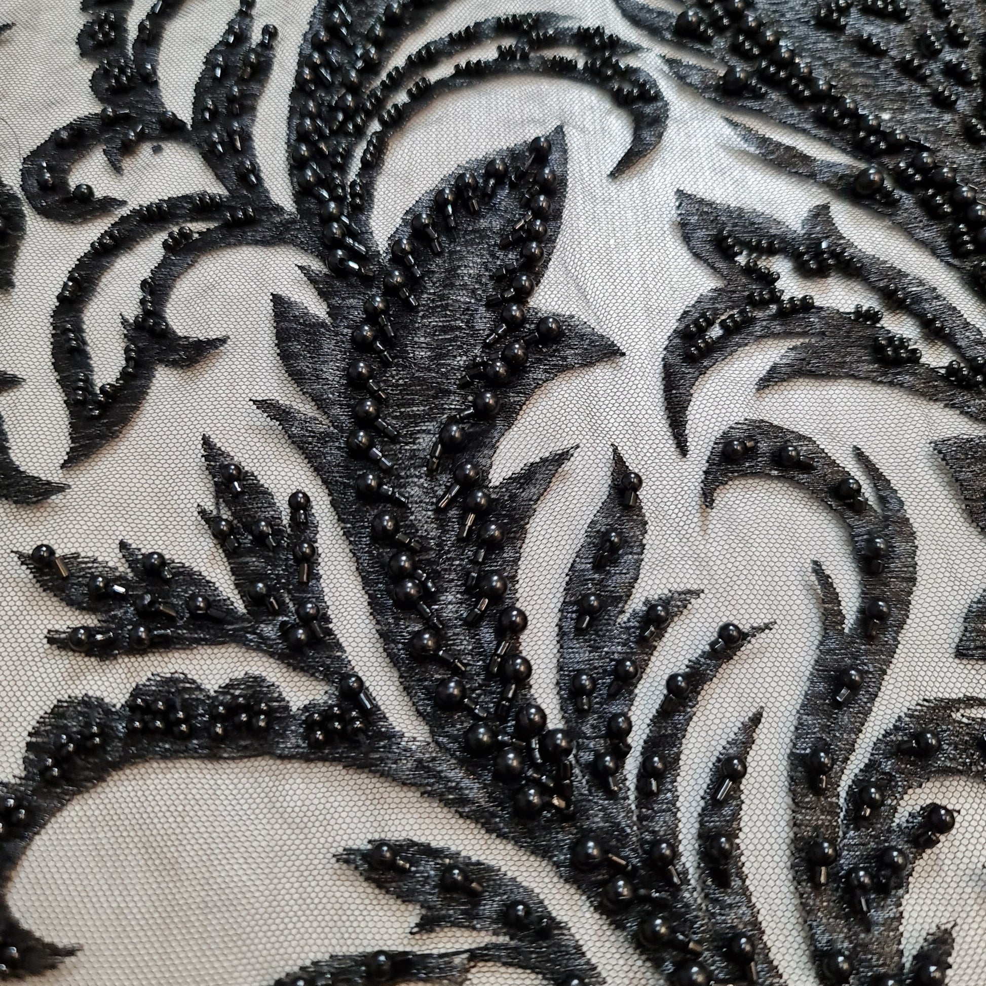 closer picture of black lace on the floor