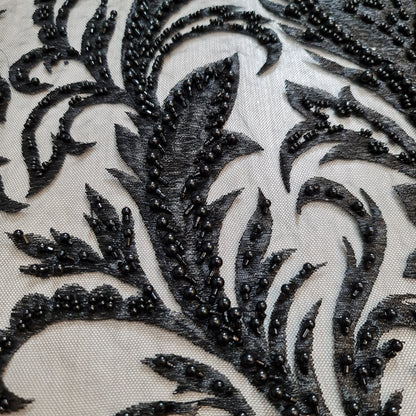 closer picture of black lace on the floor