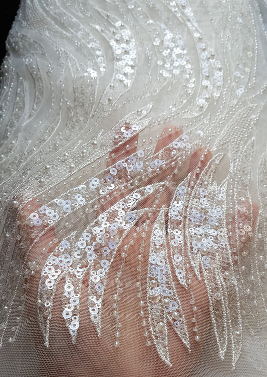 lace fabric with wave pattern in off-white color