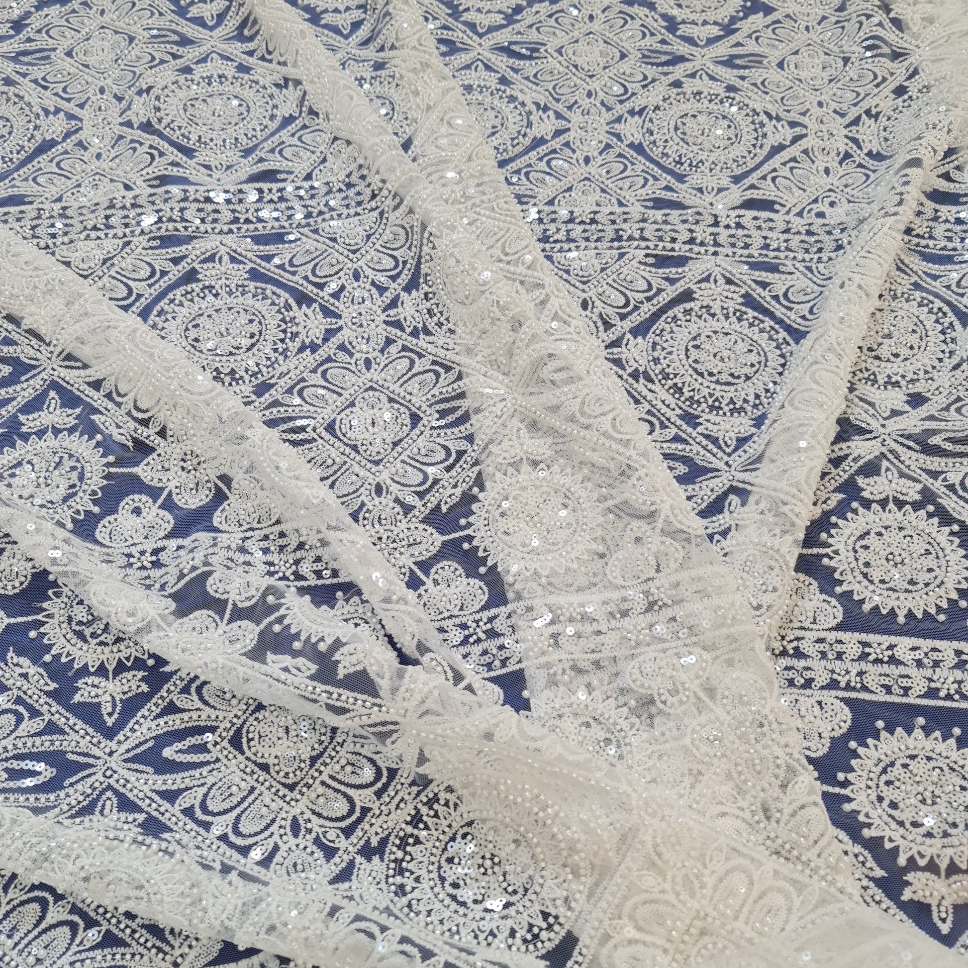 geometrical lace fabric, boho style, ornamental pattern