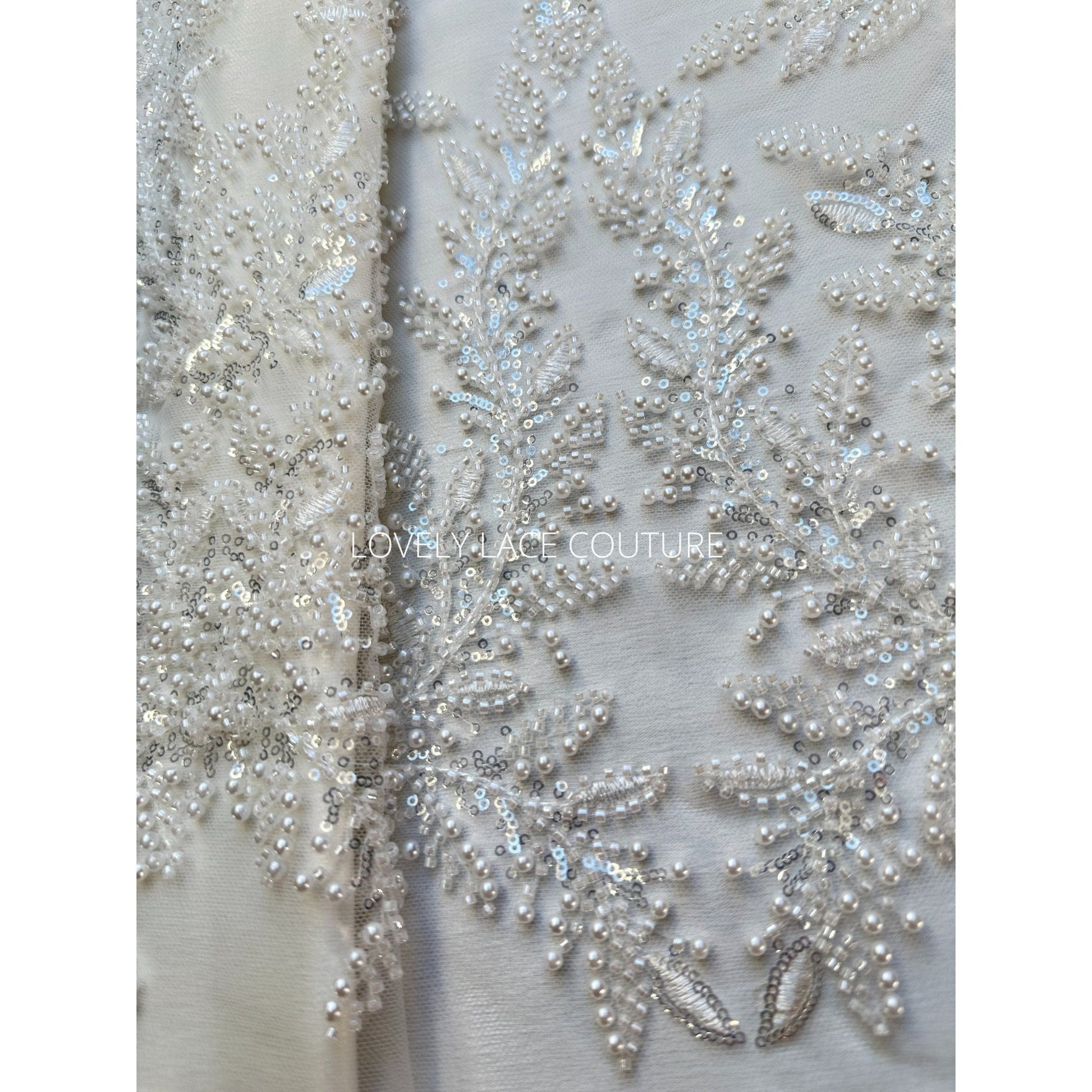 pearl lace fabric with embroidery in off-white color