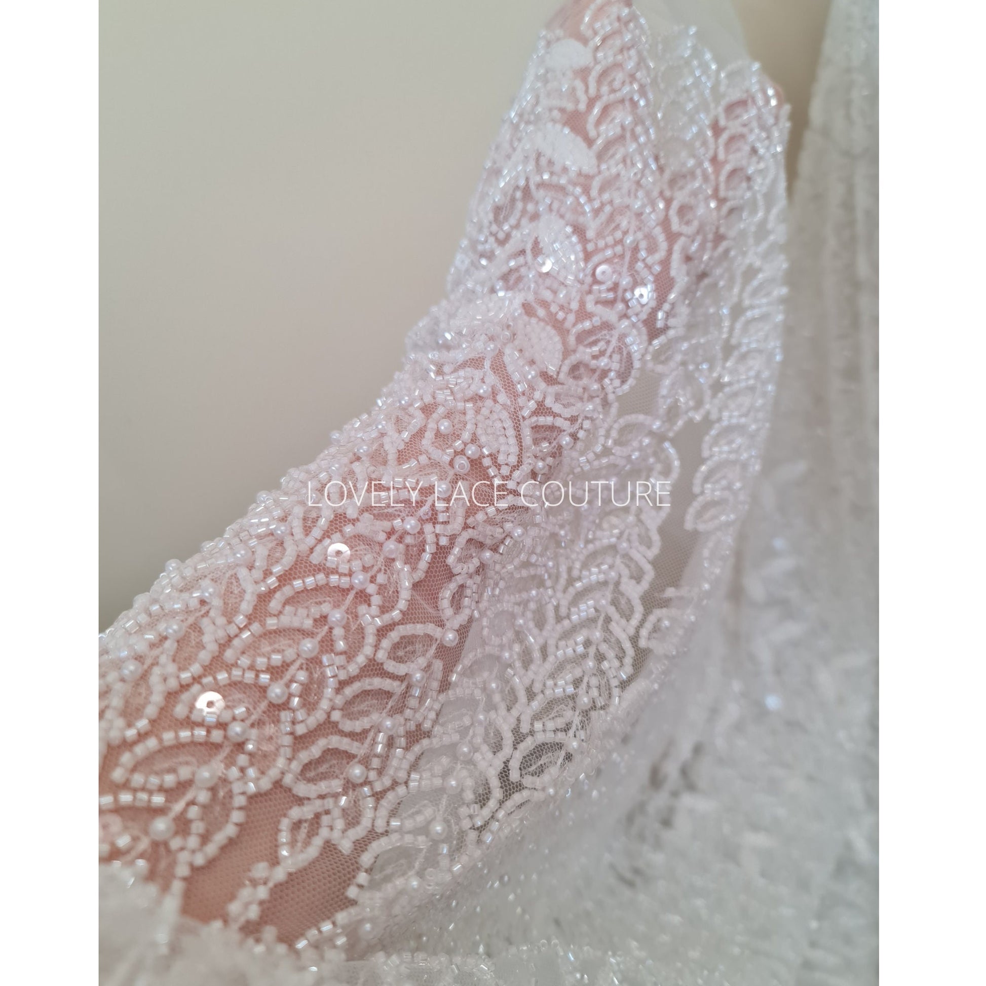 LL-1563, off-white bridal lace fabric with beads and sequins in a modern gorgoues geometrical design, fabric per meter