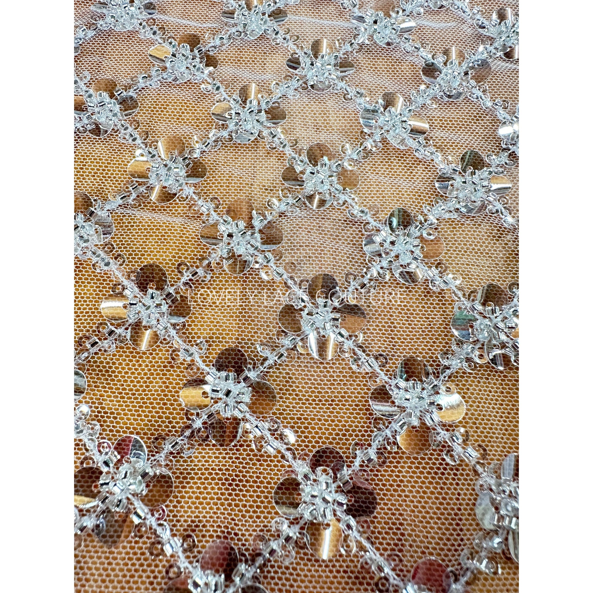 square pattern in white with silver transparent beads and transparentsmall and big sequins