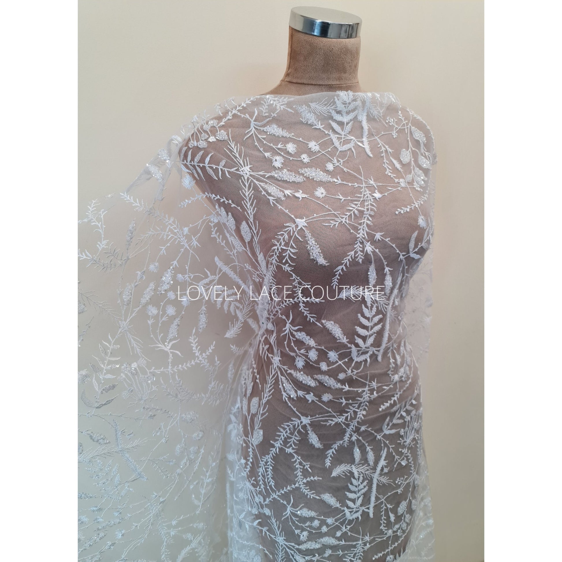 lace fabric draped on the dressform