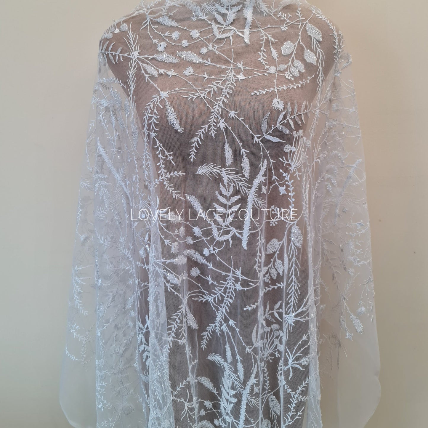 lace fabric on dressform drapped