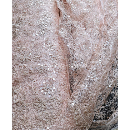 delicate lace fabric with allover abstract flower design in roségold color