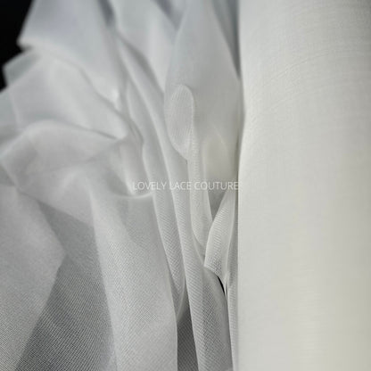 bolt off-white color, iron-on fabric lining, shown as bolt and folded