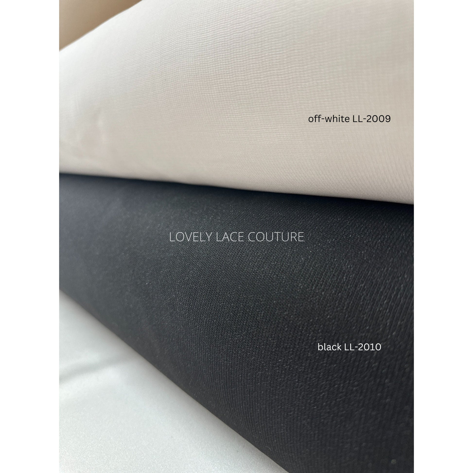 fusible fabric lining in off-white and black, bolt