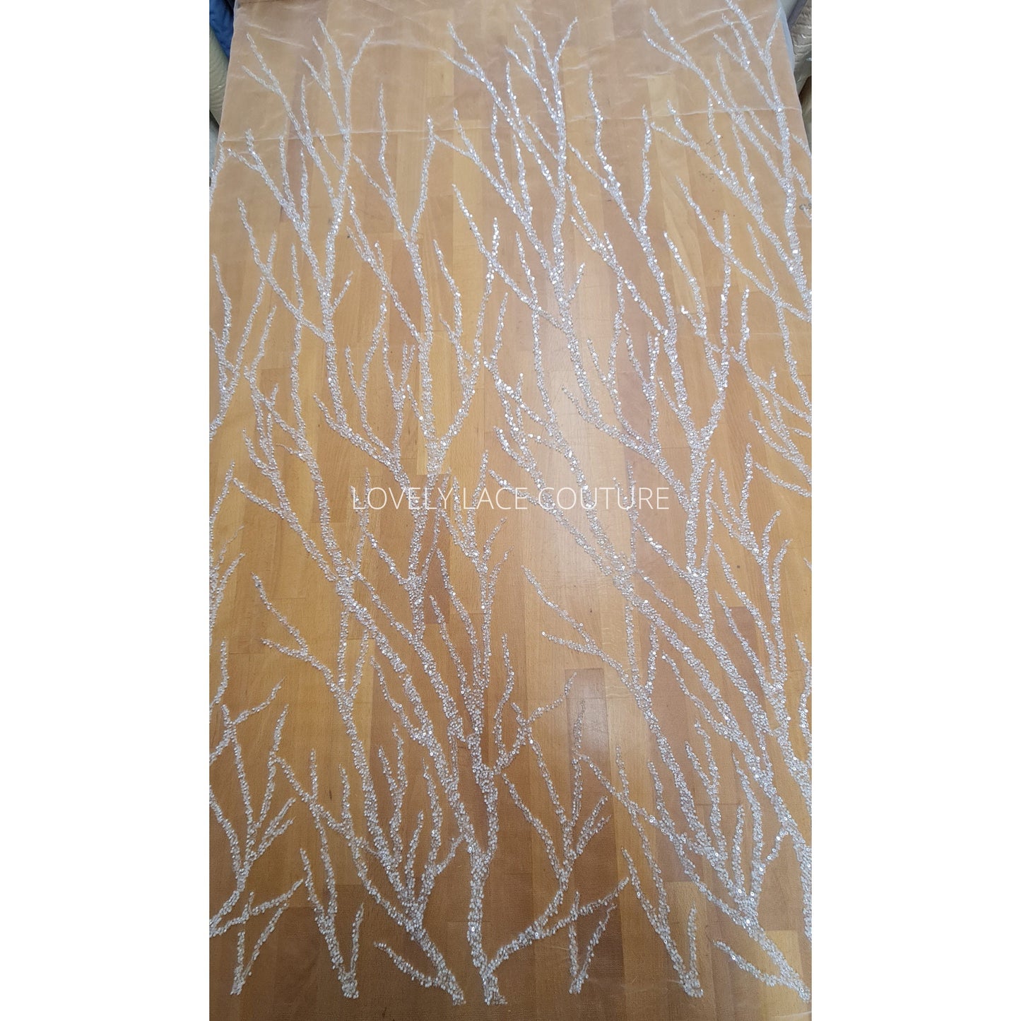 LL-1180 beautiful sparkling lace fabric with a modern abstract branch pattern in off-white color, starts at 0,5m