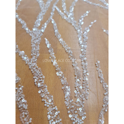 LL-1180 beautiful sparkling lace fabric with a modern abstract branch pattern in off-white color, starts at 0,5m