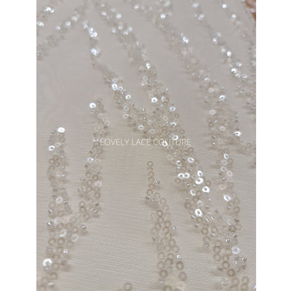 LL-1180 beautiful sparkling lace fabric with a modern abstract branch pattern in off-white color, starts at 0,5m