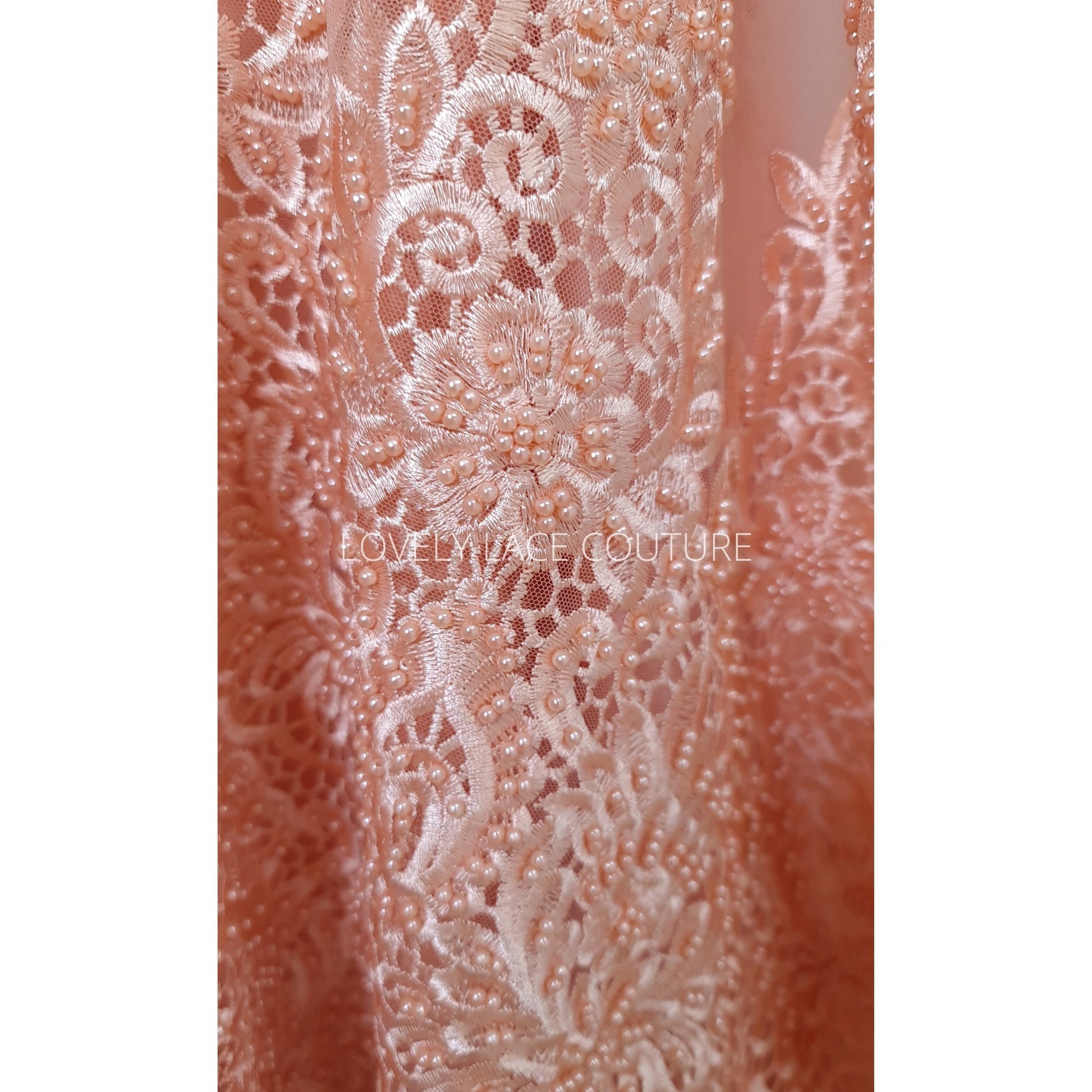 lace fabric in peach color