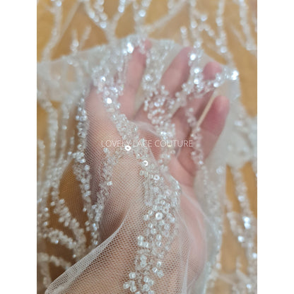 LL-1180 beautiful sparkling lace fabric with a modern abstract branch pattern in off-white color, starts at 0,5m