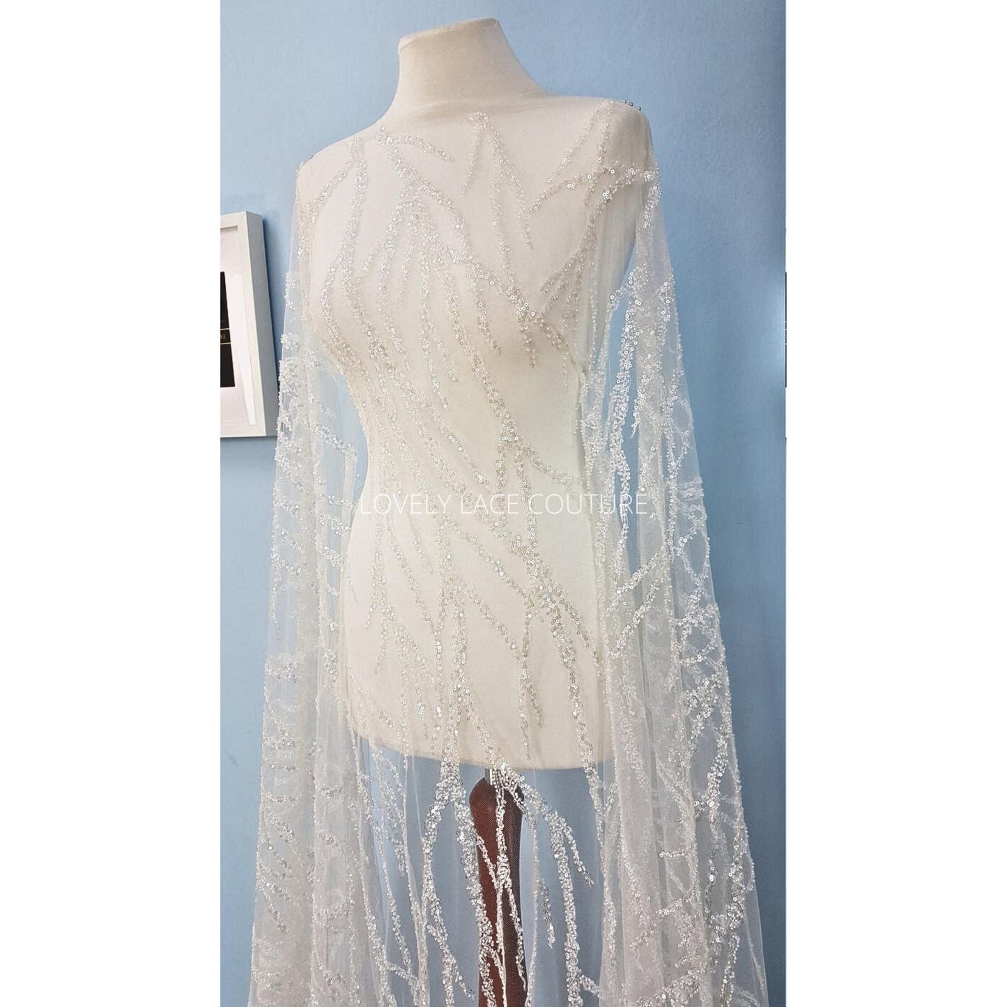 lace fabric with branches pattern beads and sequins in off-white