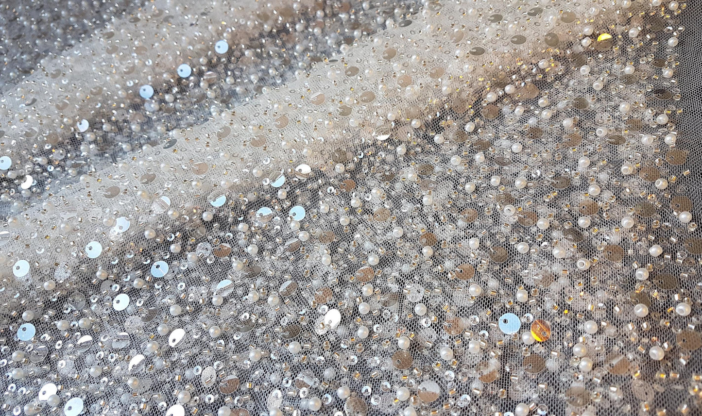 beaded lace fabric with big transparent sequins in off-white color