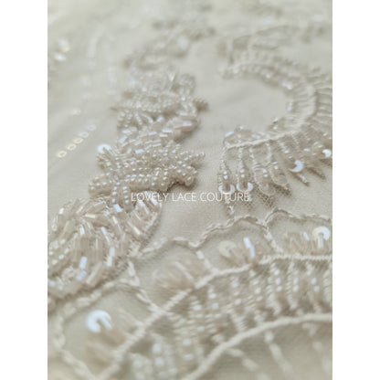 lace fabric with beads and transparent sequins for bridal wear in off-white and rosécolor