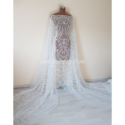 ornamental lace fabric in off-white color