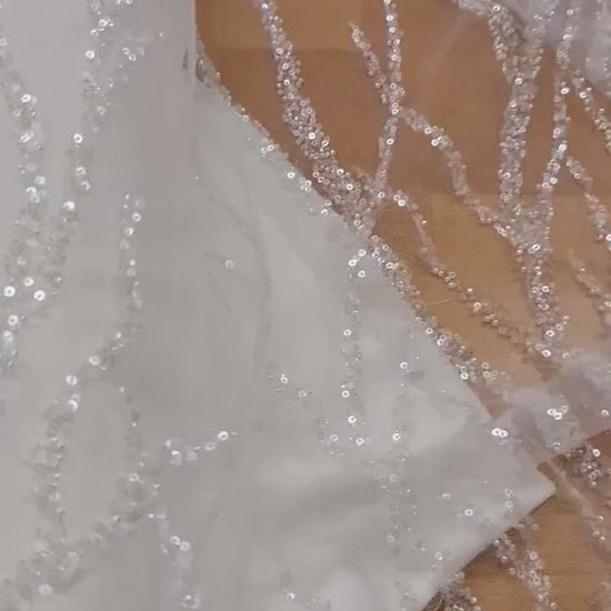 LL-1180 beautiful sparkling lace fabric with a modern abstract branch pattern in off-white color, starts at 0,5m