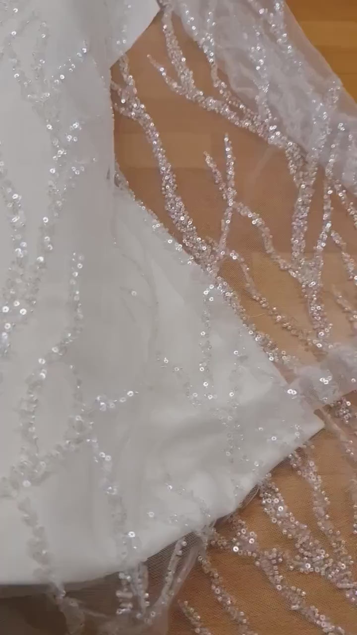 LL-1180 beautiful sparkling lace fabric with a modern abstract branch pattern in off-white color, starts at 0,5m